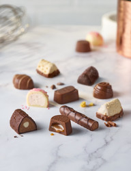 Продуктови Категории Шоколади Thorntons Колекция шоколадови бонбони - бял, млечен и черен шоколад 262 гр